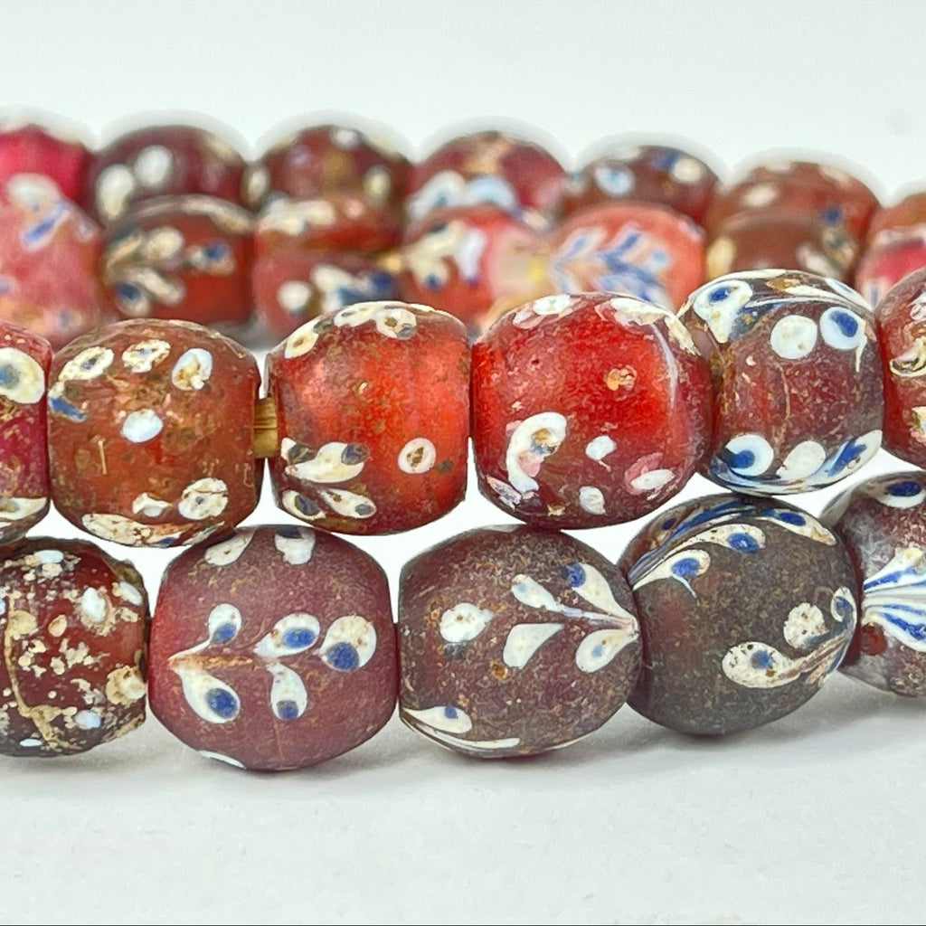 Plum Red Fancy Floral and Skunk Venetian Trade Beads