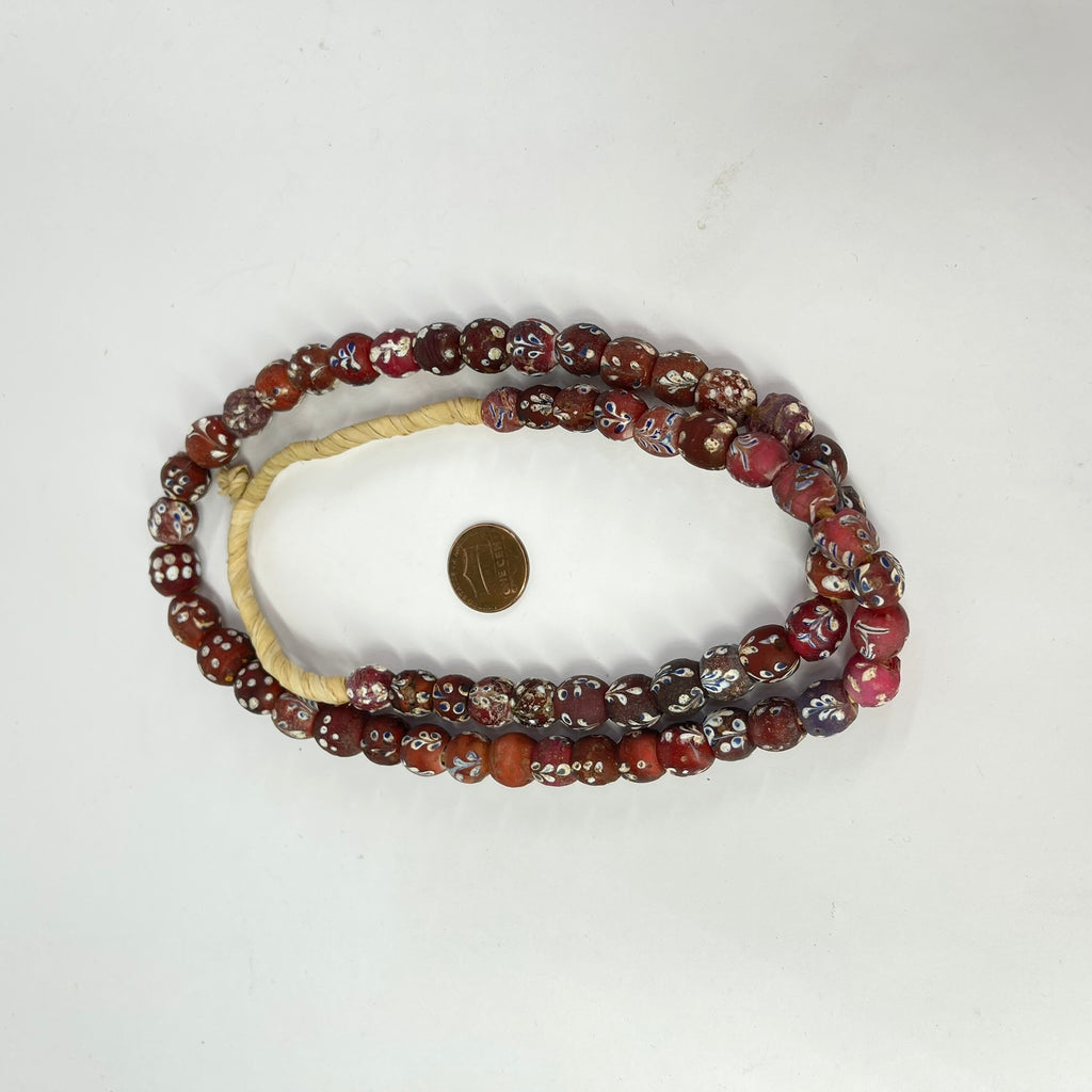 Plum Red Fancy Floral and Skunk Venetian Trade Beads