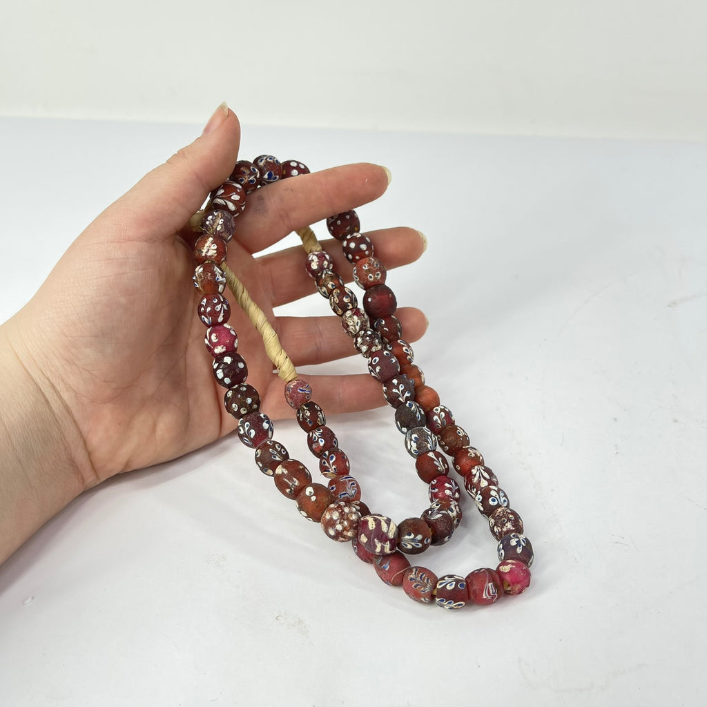 Plum Red Fancy Floral and Skunk Venetian Trade Beads