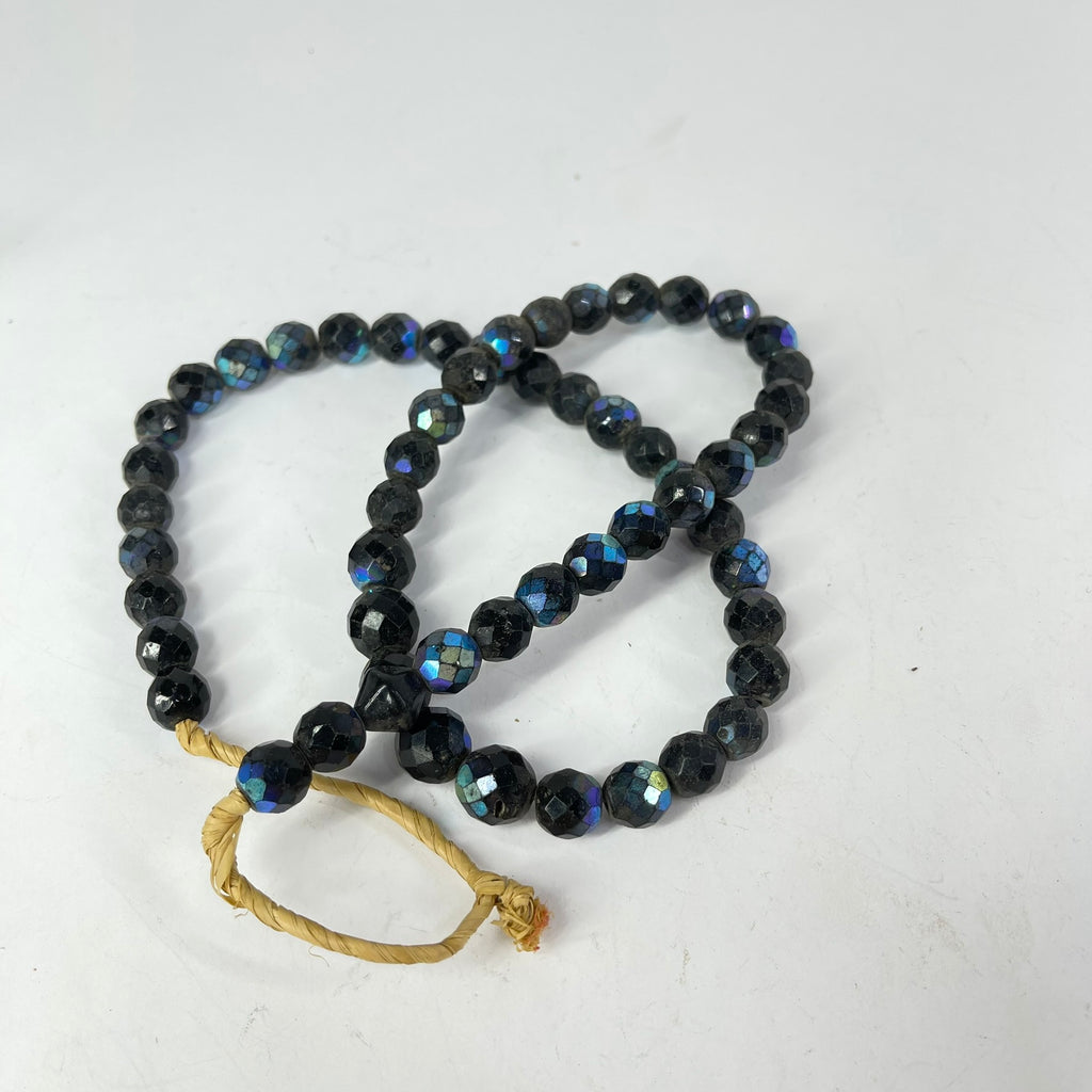 Iridescent Faceted Graduated Bohemian Black Trade Beads