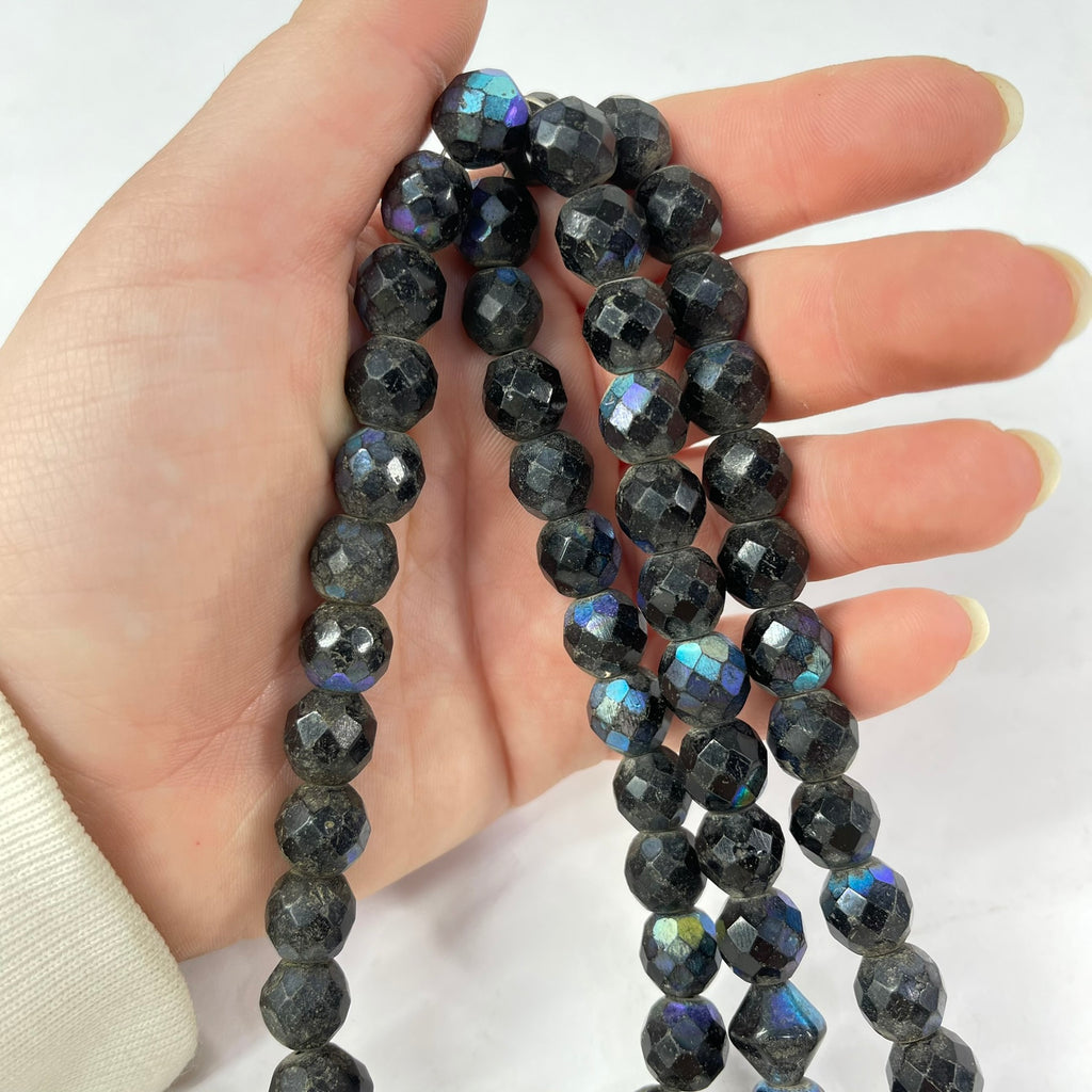 Iridescent Faceted Graduated Bohemian Black Trade Beads