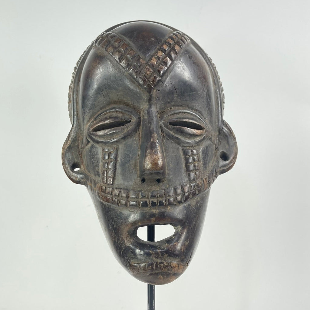 Tabwa Wood Mask with Awl Holes Congo