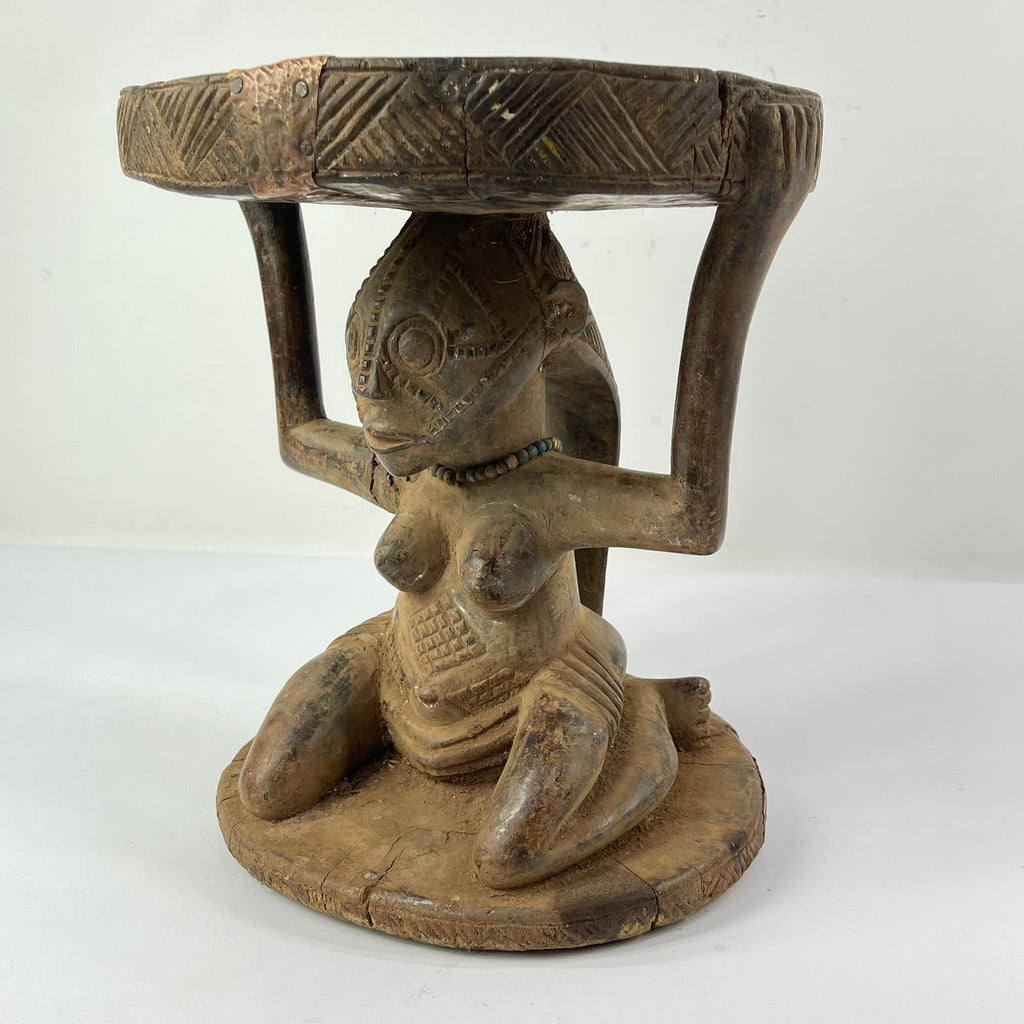 Tabwa Figural Stool with Indigenous Repairs
