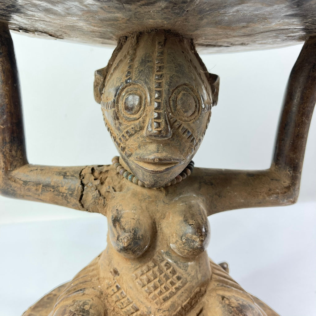 Tabwa Figural Stool with Indigenous Repairs