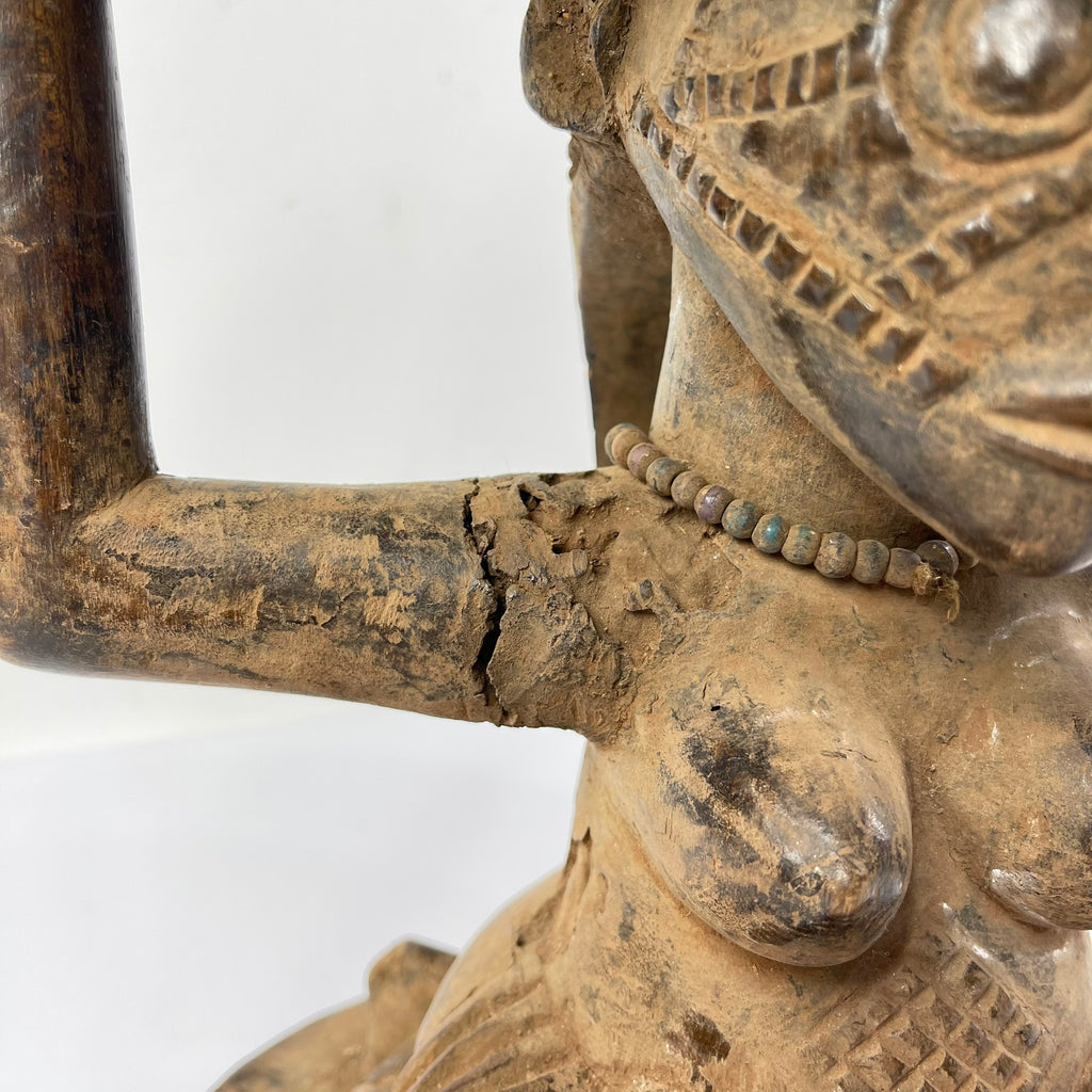 Tabwa Figural Stool with Indigenous Repairs