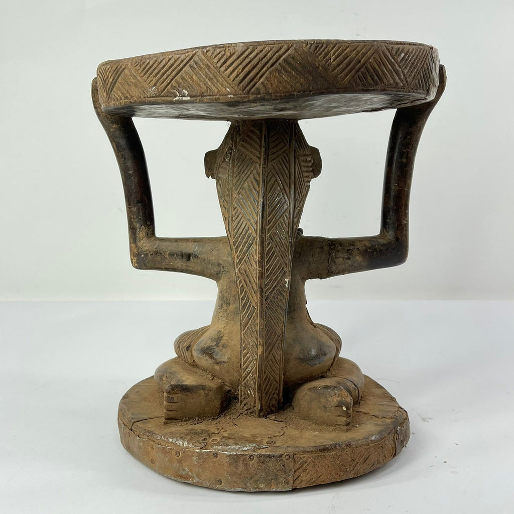 Tabwa Figural Stool with Indigenous Repairs