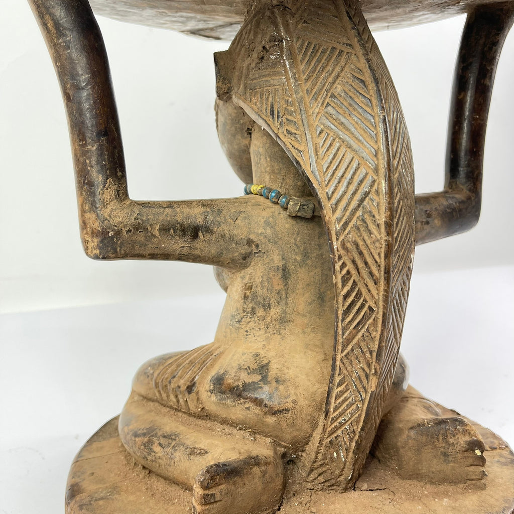Tabwa Figural Stool with Indigenous Repairs