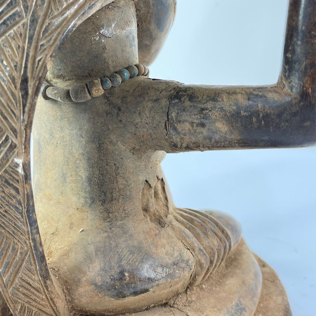 Tabwa Figural Stool with Indigenous Repairs