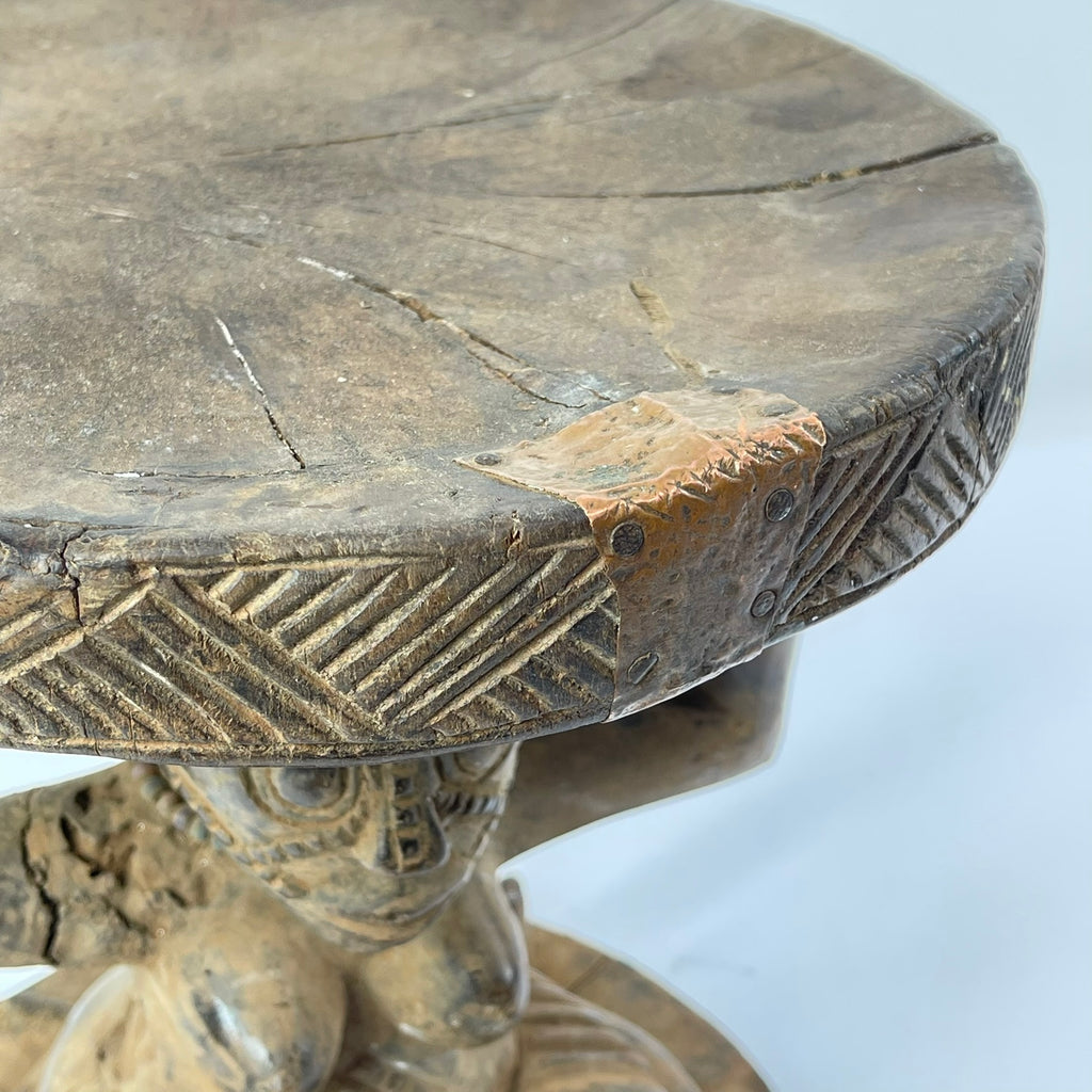 Tabwa Figural Stool with Indigenous Repairs
