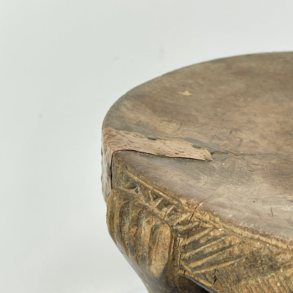 Tabwa Figural Stool with Indigenous Repairs
