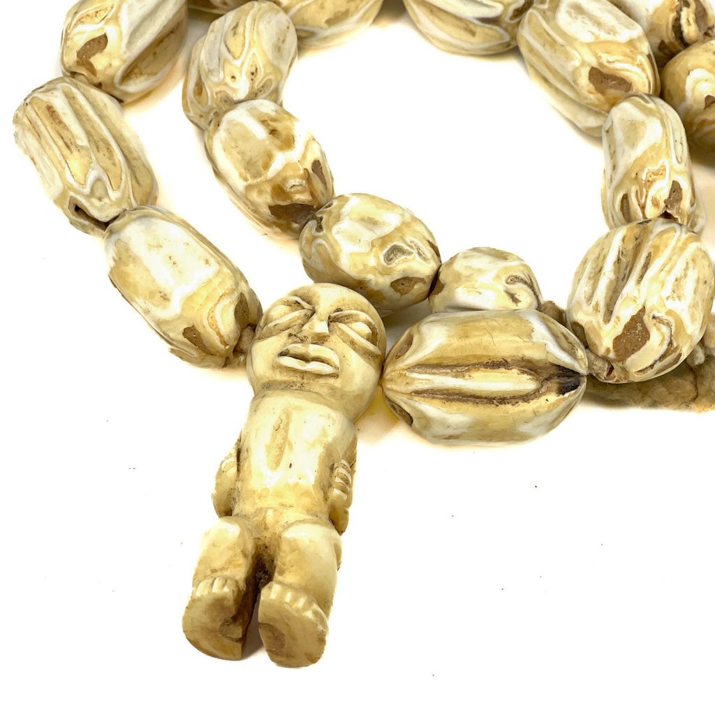 Carved Bone Beads with Figural Pendant 32 Inch