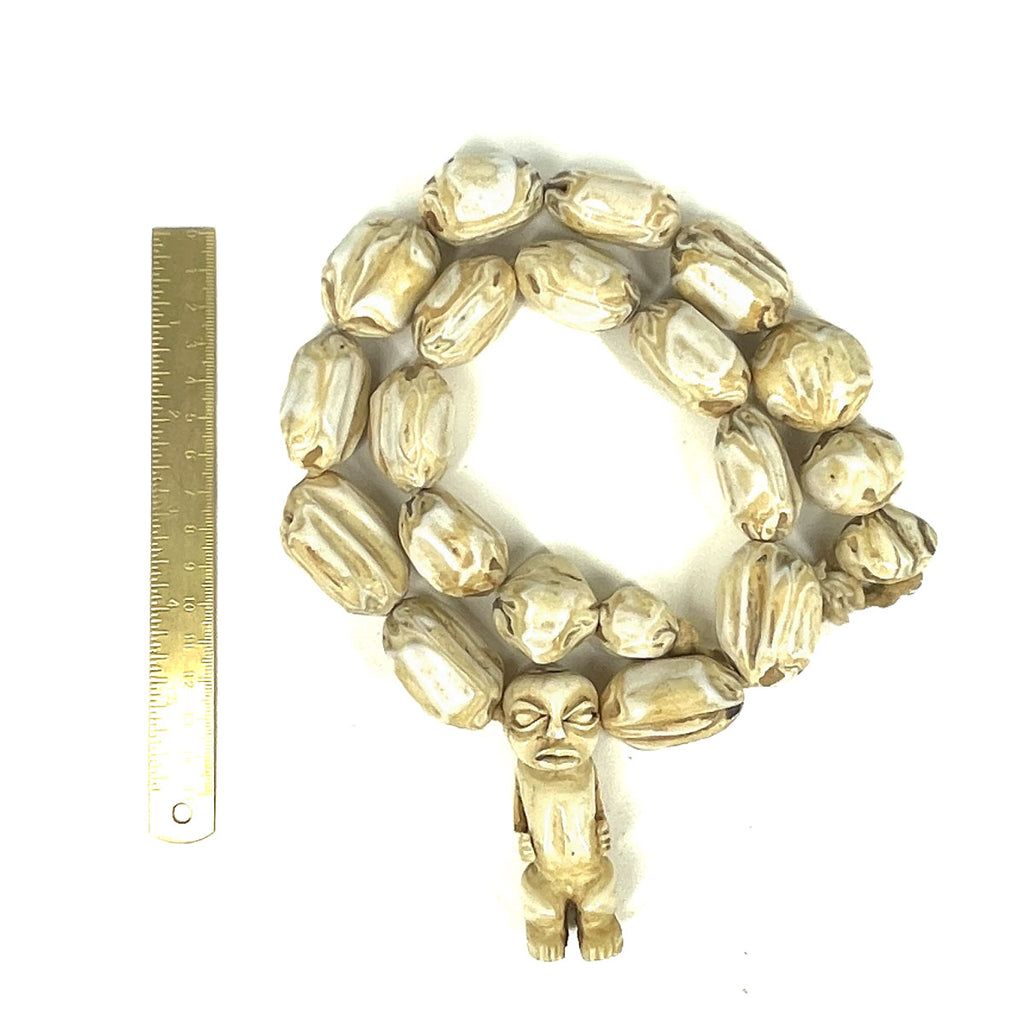 Carved Bone Beads with Figural Pendant 32 Inch